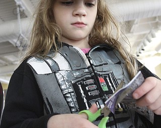 William D Lewis the Vindicator  Sophia Fraser, 7, of Struthers works on a craft project during a Star Wars themed event at the Poland Library Saturday 10-10-14.