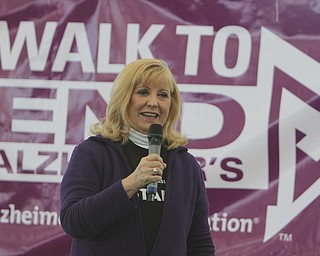 Helen Paes , Alzheimers Walk coordinator, gives opening remarks during the Walk to End Alzheimers  at the Watson and Tressel Training Site on Saturday morning.   Dustin Livesay  |  The Vindicator  10/11/14  WATTS, YSU