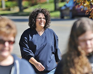 Jeff Lange | The Vindicator  Suzette Lucente of North Lima enjoys the weather as she participates in the CROP Walk in the streets of Youngstown, Sunday afternoon.