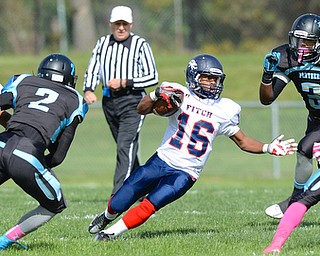 Jeff Lange | The Vindicator  Fitch's Jaylen Sanders (16) navigates his way through host of Panthers defenders early in the first quarter of Saturday's matchup at Rayen Stadium.