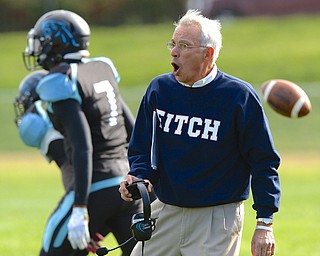 Jeff Lange | The Vindicator  Austintown head coach Phil Annarella coaches his team from the sidelines of Saturday's contest against the East Panthers at Rayen Stadium.
