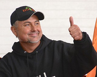 Jeff Lange | The Vindicator  Vince Cappitte of Girard gives a thumbs up after his pumpkin weighed in at 1,235 pounds during the 20th annual Giant Pumpkin Weigh-Off held at Parks Garden Center.