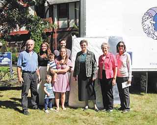 SPECIAL TO THE VINDICATOR Sleepy Hollow Sleep Shop on Salt Springs Road, Youngstown, and its owners, the Berry family, recently donated 32 twin mattresses and box springs to the Beatitude House. The donation will support the transitional housing apartments for women and children in Mahoning, Trumbull and Ashtabula counties. Above, members of the Berry family stand with Sister Janet Gardner, Beatitude House executive director and Sister Mary Alyce Koval, BH education/career coordinator. From left are Bruce Berry, Laura Berry, Drew Carchedi, Missy Carchedi holding Marco Carchedi, Sister Janet, Sister Mary Alyce and Patricia Berry. The little girl is Capri Carchedi.