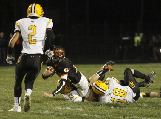 ROBERT  K. YOSAY | THE VINDICATOR.Crestview at Springfield..Springfields #11 Ryan Kohler gets stopped by Crestviews #17 Zach Marr #18Dean Foster and #2 Spencer DeSalvo watches