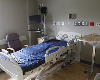        ROBERT K. YOSAY  | THE VINDICATOR...St Elizabeths Medical Center - Isolation Room  - Control panel for room.  with extra door sealents and controls ..-30-