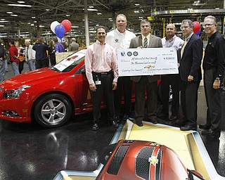        ROBERT K. YOSAY  | THE VINDICATOR..Plant Manager - Steve Notar Donato  Glenn Johnson - Robert Morales - Sherrod Brown and Greg Greenwood..UAW Locals 1112 and 1714 purchased the one millionith Cruze  that was  raffled to a Lordstown UAW team member. (Sharon Frey of Mineral Ridge.- Raffle proceeds beyond the cost of the Cruze were donated to the St. Vincent DePaul Society of Youngstown. US REp Sherrod Brown will drew the winning name. ..-30-
