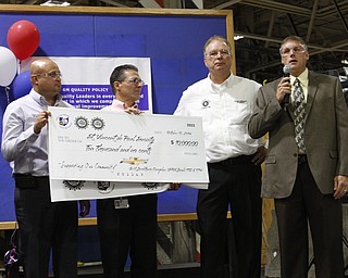        ROBERT K. YOSAY  | THE VINDICATOR..Robert Morales - Plant Manager - Steve Notar Donato  Glenn Johnson and Brian Antal..  of the St Vincent DePaul food bank..UAW Locals 1112 and 1714 purchased the one millionith Cruze  that was  raffled to a Lordstown UAW team member. (Sharon Frey of Mineral Ridge.- Raffle proceeds beyond the cost of the Cruze were donated to the St. Vincent DePaul Society of Youngstown. US REp Sherrod Brown will drew the winning name. ..-30-