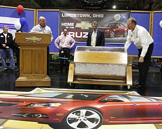        ROBERT K. YOSAY  | THE VINDICATOR..Robert Morales -Plant Manager - Steve Notar Donato - Sherrod Brown -  Glenn Johnson stir the tickets.. UAW Locals 1112 and 1714 purchased the one millionith Cruze  that was  raffled to a Lordstown UAW team member. (Sharon Frey of Mineral Ridge.- Raffle proceeds beyond the cost of the Cruze were donated to the St. Vincent DePaul Society of Youngstown. US REp Sherrod Brown will drew the winning name. ..-30-