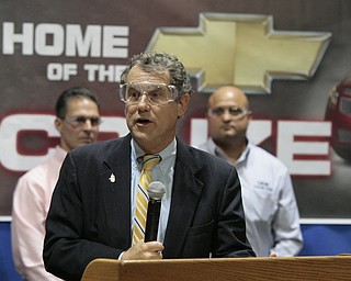        ROBERT K. YOSAY  | THE VINDICATOR..Sherrod Brown..UAW Locals 1112 and 1714 purchased the one millionith Cruze  that was  raffled to a Lordstown UAW team member. (Sharon Frey of Mineral Ridge.- Raffle proceeds beyond the cost of the Cruze were donated to the St. Vincent DePaul Society of Youngstown. US REp Sherrod Brown will drew the winning name. ..-30-
