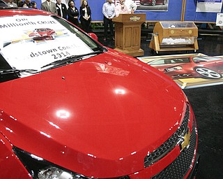        ROBERT K. YOSAY  | THE VINDICATOR..Plant Manager - Steve Notar Donato -talks about  the 1 millionith car and cooperation of the  plant to help the community..UAW Locals 1112 and 1714 purchased the one millionith Cruze  that was  raffled to a Lordstown UAW team member. (Sharon Frey of Mineral Ridge.- Raffle proceeds beyond the cost of the Cruze were donated to the St. Vincent DePaul Society of Youngstown. US REp Sherrod Brown will drew the winning name. ..-30-