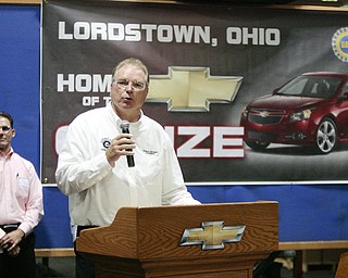        ROBERT K. YOSAY  | THE VINDICATOR..UAW Locals 1112 and 1714 purchased the one millionith Cruze  that was  raffled to a Lordstown UAW team member. (Sharon Frey of Mineral Ridge.- Raffle proceeds beyond the cost of the Cruze were donated to the St. Vincent DePaul Society of Youngstown. US REp Sherrod Brown will drew the winning name. ..-30-