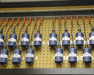 Katie Rickman | The Vindicator.Altronic coils are tested in the facility in Girard on Thursday, Oct. 16, 2014.