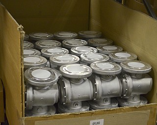 Katie Rickman | The Vindicator.Valves that are a part of the GTI Package at Altronic sit in box in the facility in Girard on Thursday, Oct. 16, 2014.