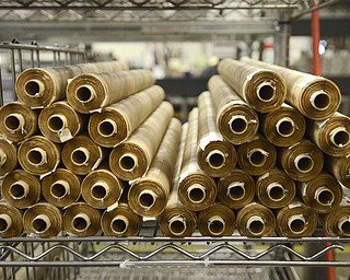 Katie Rickman | The Vindicator.High voltage wire sits on a shelf at Altronic in Girard to be worked on the next day on Thursday, Oct. 16, 2014.