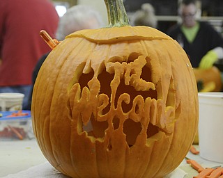 Katie Rickman | The Vindicator.Volunteers participate in pumpkin carving over a three day period leading up to the Pumpkin walk which  took place Sunday, Oct 19, 2014 at Fellows Riverside Gardens in Youngstown.