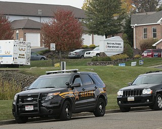        ROBERT K. YOSAY  | THE VINDICATOR..The Youngstown Police Dept  bomb squad set off what appeared to be a pipe bomb outside a broken window at the Betras, Harshman and Kopp law office in Canfield on Seville Dr...that ended up not being explosive....-30-