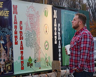 Katie Rickman | The Vindicator.Dave Howe of McDonald looks at the map at the entrance of the Maze Craze in New Springfield on Friday, September 17, 2014.