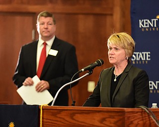 KENT, OHIO - OCTOBER 15, 2014: Beverly Warren the President of Kent State University speaks at the podium during a press conference Schwartz Center regarding Ebola, Wednesday afternoon. (Photo by David Dermer/Youngstown Vindicator) Eric Mansfield pictured behind.