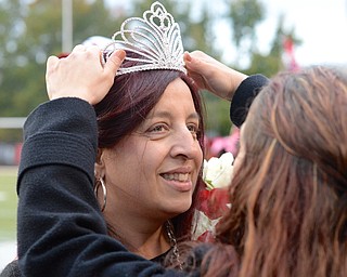 Jeff Lange | The Vindicator  YSU student Rebecca Banks is crowned after being declared YSU's homecoming queen of 2014, Saturday evening during the halftime of Youngstown's matchup with the Southern Illinois Salukis.