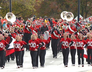 Jeff Lange | The Vindicator  Youngstown marching band is led by the flag line in the parade, Saturday afternoon during the homecoming parade.