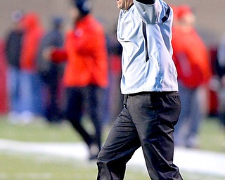 Jeff Lange | The Vindicator  Youngstown special teams coordinator Mike Zordich reacts to a third quarter sack, Saturday evening at Stambaugh Stadium.