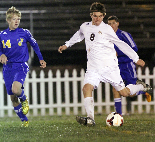 William D. Lewis The Vindicator  SR's ColeDurina(8) keeps the ball from Lake Center's Parker Griffith(14) during 10-21-14 action at SR.