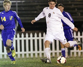 William D. Lewis The Vindicator  SR's ColeDurina(8) keeps the ball from Lake Center's Parker Griffith(14) during 10-21-14 action at SR.