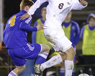 William D. Lewis The Vindicator SR's Cole Durina(8) keeps the ball from Lake Center's Josh Sample during 10-21-14 action at SR.