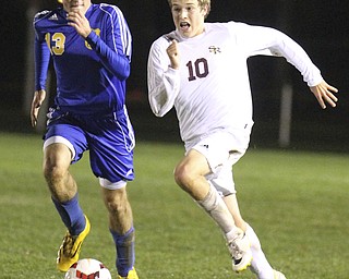 William D. Lewis The Vindicator SR's Brandon Youngs(10) and Lake Center's Wade Kyser(13) go for the ball during 10-21-14 action at SR.