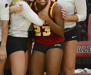 Katie Rickman | The Vindicator.Makenna Ozenghar (22) on left embraces Lauren Lottier after Mooney defeated Mineral Ridge in the district semifinal game at Salem High School on Wednesday, Oct. 22, 2014.