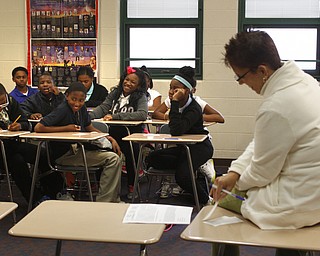  .          ROBERT  K. YOSAY | THE VINDICATOR..Rayen Early College M.S.- Inside Chaney, Hazelwood, Youngstown Quaglia Work groups .Melissa Forde  -  reads aloud one  item about each student as the groups of 6-7-8 grade students get together....-30-