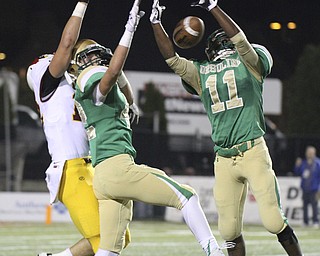William D. Lewis The vindicator  Ursuline's Marus Mosley(11)picks off a pass intended for Mooney's Andrew Armstrong(12) Also in for ursuline is John Matyrsyzn(42) during 10242014 game.