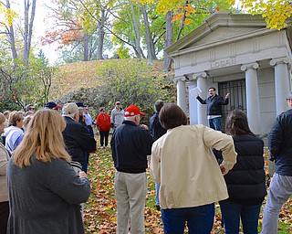 Jeff Lange | The Vindicator  Tour guide Frank Rulli speaks about John Logan and the history of the Oak Hill Cemetery at the first stop of the tour, Saturday afternoon at Oak Hill Cemetery.