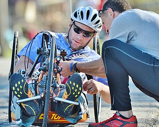 Jeff Lange | The Vindicator  Brett Clingan of Champion (left) gets assistance from long-time friend Allen Sparks as he prepares for the Peace Race 10K, Sunday afternoon at Kirkmere School.