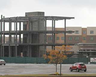        ROBERT K. YOSAY  | THE VINDICATOR...The Cafaro Co. will move its family to a new home in 2015.The new 50,000-square-foot Cafaro corporate headquarters will be an updated, more open space for its 200 employees, or, as the Cafaros called them, extended family members.it will be close to the Residence Inn and the Eastwood Mall..-30-