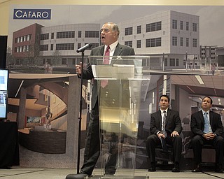        ROBERT K. YOSAY  | THE VINDICATOR..Tony Cafaro with  his sons Anthony and William .The Cafaro Co. will move its family to a new home in 2015.The new 50,000-square-foot Cafaro corporate headquarters will be an updated, more open space for its 200 employees, or, as the Cafaros called them, extended family members.it will be close to the Residence Inn and the Eastwood Mall..-30-