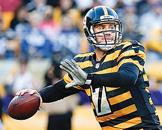Steelers quarterback Ben Roethlisberger (7) set several team records during Sunday’s 51-34 win over the Colts at Heinz Field in Pittsburgh.