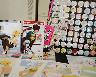 Katie Rickman | The Vindicator .Stickers, books, buttons, and patches are among the many items made by Black Street Entertainment owners Justin and Terry Raimey of Youngstown.