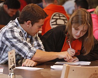        ROBERT K. YOSAY  | THE VINDICATOR..ez pz as John Skoloda a senior at Poland and Mackenzie Allen of Boardman..  get to the final answer on a math problem..More than 400 students from 39 high schools from throughout Northeast Ohio filled Youngstown State UniversityÕs Kilcawley Center Chestnut Room Thursday for MathFest hosted by YSUÕs mathematics and statistics department...-30-