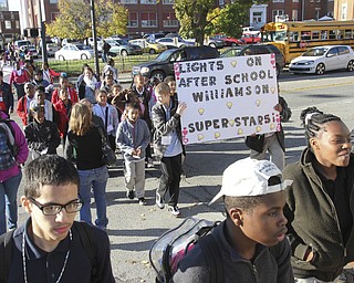 William D. Lewis The Vindicator  Hundreds of Youngstown City Schools students march along Wood St. during a Thursday 10242014 parade promoting after school activiites.
