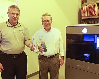        ROBERT K. YOSAY  | THE VINDICATOR..Ted  and  Paul Palovich and Printing 3-D Parts is a commercial enterprise that uses 3-D printing and scanning technologies in production for the packaging and container industries. The company claims to be the first of its kind in the Mahoning Valley....-30-