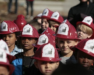        ROBERT K. YOSAY  | THE VINDICATOR..Kindergarten students from  E J BLOTT in Liberty head out with red fire hats from Gibson Insurance who sponsored the event with the Red Cross and  Liberty FD ...-30-