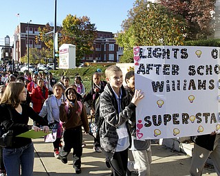 William D. Lewis The Vindicator  Hundreds of Youngstown City Schools students march along Wood St. during a Thursday 10242014 parade promoting after school activities.