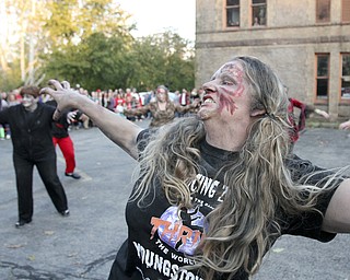 William D. Lewis the Vindicator  Paulina McCallum of Youngstown does the  Michael Jackson Thriller dance performed at B&O Station before Zombie Crawl.