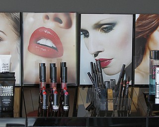        ROBERT K. YOSAY  | THE VINDICATOR.....A locally-owned beauty shop in Boardman recently opened a new location and offers a variety of services from airbrush makeup to extensions and tanning. , has expanded her client base through social media and her work. She does her work with an all-natural makeup she sells at her shop..-30-