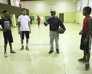 William D. Lewis the vindicator .pastor charles Hudson , center, talks about his bondage breakers program at Martin Luther Luhteran Church in Youngstown.