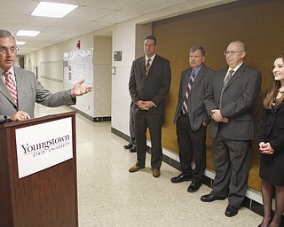        ROBERT K. YOSAY  | THE VINDICATOR..President Jim Tressel - Rep Tim Ryan - Tim Wagner (YSU) and Allen Hunter (YSU)  and student at YSU Jennifer Miller National Science Foundation-supported chemistry lab that places Youngstown State University among the best in the nation for materials analysis with a new x-ray diffraction Labratory . .-30-