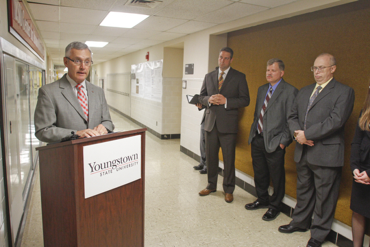        ROBERT K. YOSAY  | THE VINDICATOR..President Jim Tressel - Rep Tim Ryan - Tim Wagner (YSU) and Allen Hunter (YSU)  National Science Foundation-supported chemistry lab that places Youngstown State University among the best in the nation for materials analysis with a new x-ray diffraction Labratory . .-30-