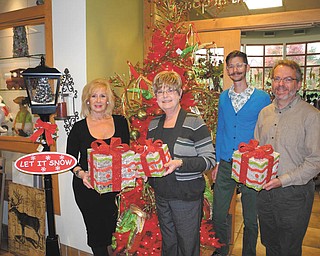 SPECIAL TO THE VINDICATOR
The Shop in the Gardens will be the site of a holiday open house. From left to right are Jeanne Simeone, merchandise buyer; Eileen Stankovich, shop manager, Paul Hagman, president of Friends of Fellows Riverside Gardens; and Keith Kaiser, horticulture director.