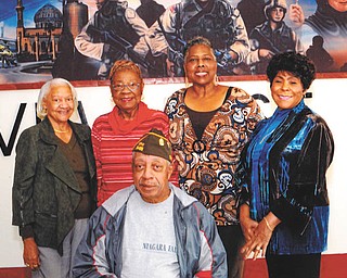 SPECIAL TO THE VINDICATOR
VFW Post 6488 and its Ladies’ Auxiliary are planning an annual Veterans Day observance and luncheon at 11 a.m. Nov. 11 at the post, 2065 Coitsville-Hubbard Road, Youngstown. The speaker will be the Rev. William J. Blake. The observance will honor the 333rd and 969th Field Artillery Battalions from the Battle of the Bulge. Standing from left to right are Joyce Paul, treasurer; Katherine Williams, cochairman; Geraldine Crenshaw, secretary; and Jessie Copeland, coordinator. Seated is Raleigh Rupert, senior vice commander and cochairman.